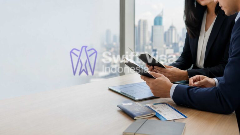Business professionals reviewing passports and travel documents for a business visa extension in Indonesia