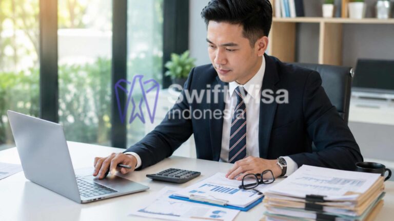 Professional Indonesian accountant analyzing financial graphs and tax reports on a laptop, providing Corporate Services and Tax Accounting Indonesia.